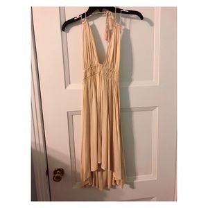 Cream V neck and open back dress